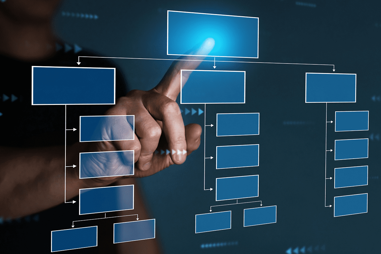 Finger pointing to a screen with mockup layout